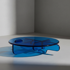 Contemporary plump transparant blue acrylic round coffee table
