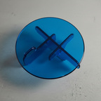 Contemporary plump transparant blue acrylic round coffee table
