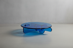 Contemporary plump transparant blue acrylic round coffee table