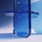 Contemporary plump transparant blue acrylic round coffee table