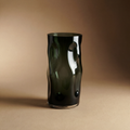 Smoked glass vase with organic dimpled surface sculptural form
