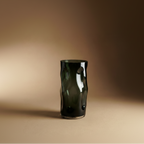 Smoked glass vase with organic dimpled surface sculptural form