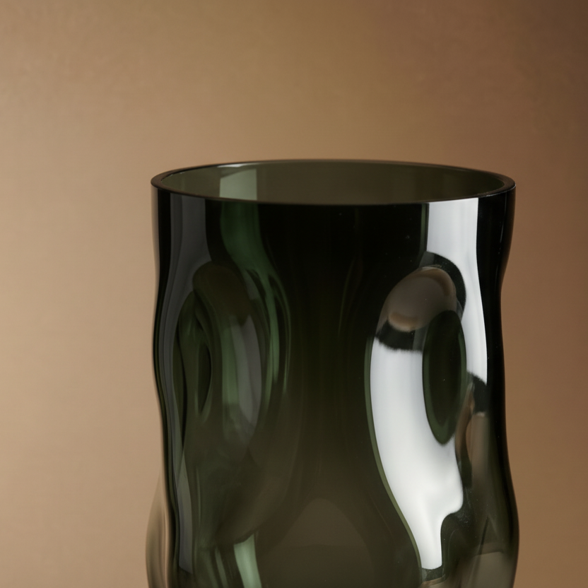 Smoked glass vase with organic dimpled surface sculptural form