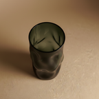 Smoked glass vase with organic dimpled surface sculptural form