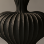Ribbed biomorphic artisan pottery vase